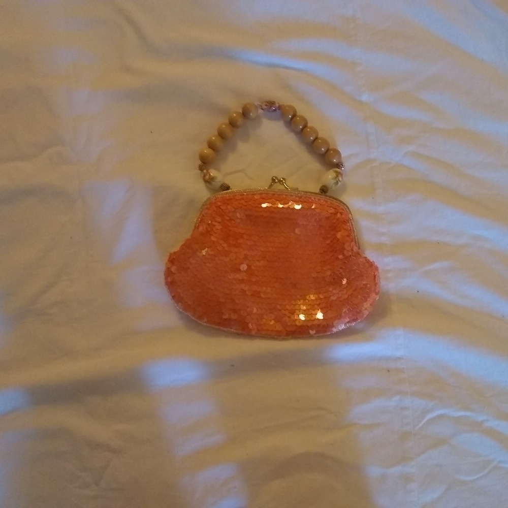Orange sequin purse